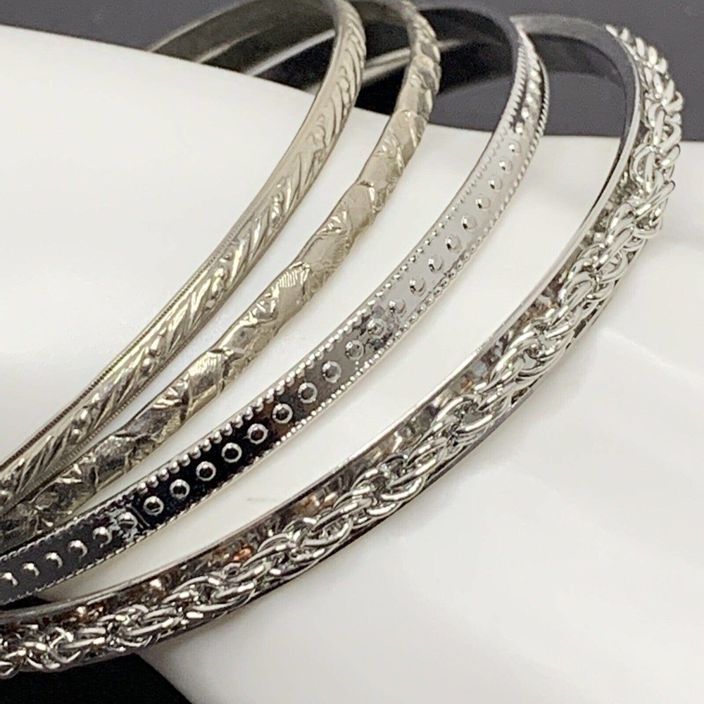 Four Silver Tone Bangles - image 4